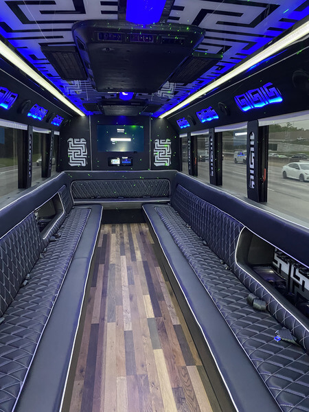 40 passenger party bus blue ceiling and long lounge seating
