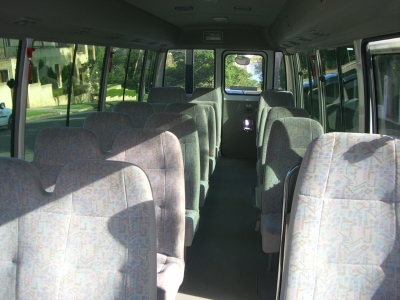 20 passenger shuttle bus interior with gray fabric seating layout